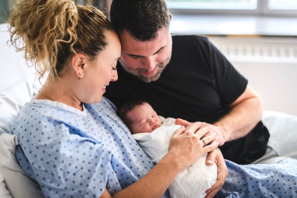 parents welcoming new baby in hospital