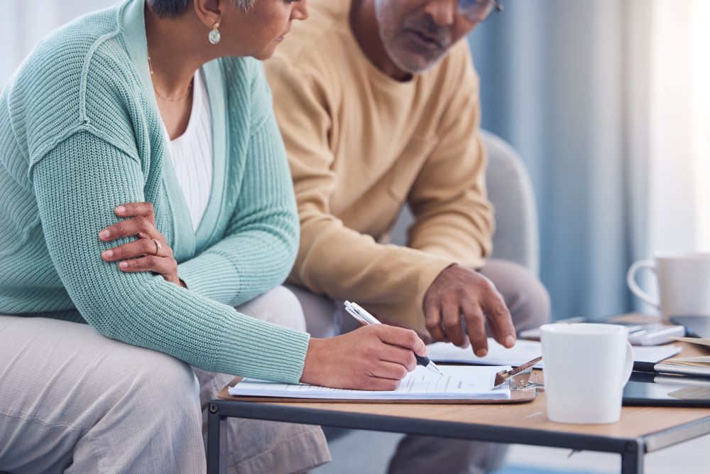 couple reviewing paperwork